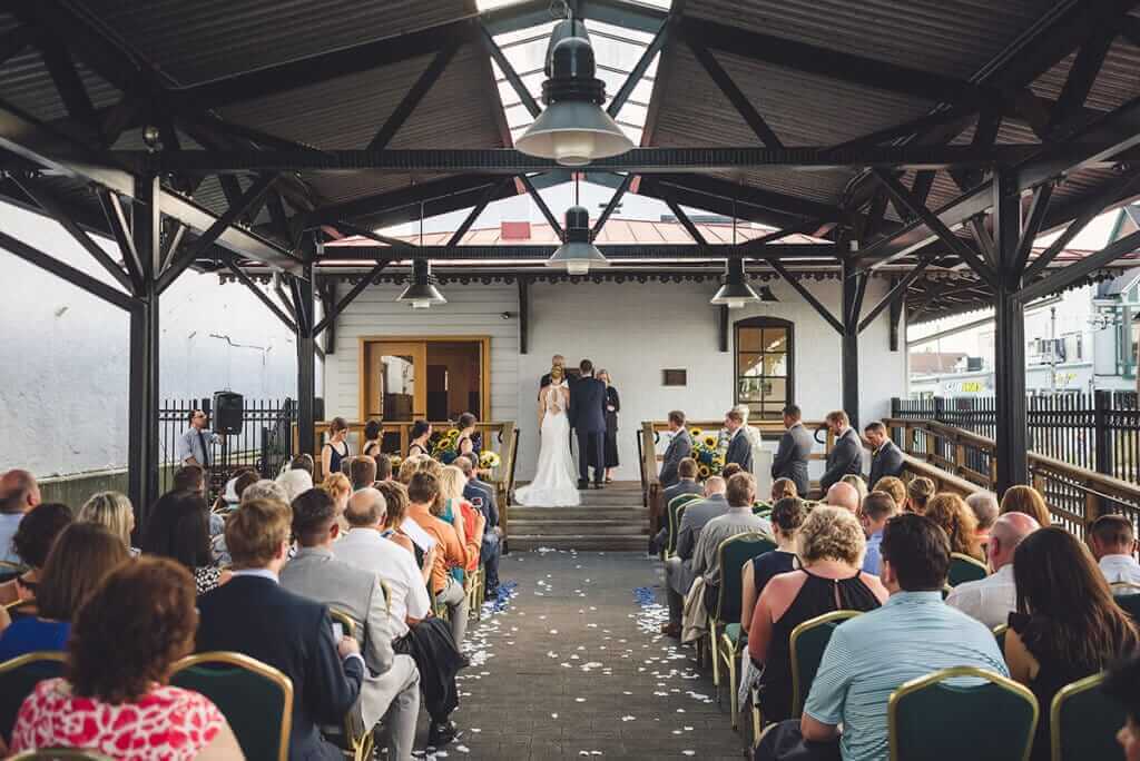 bride and groom exchanging vows outside Gettysburg Lincoln Railroad Station